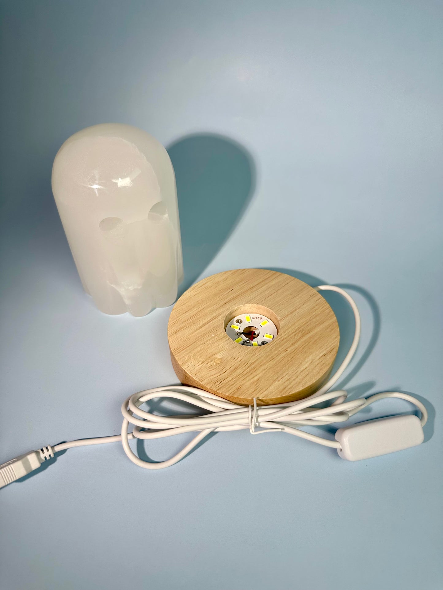 Hand-Carved Onyx Ghost Carving with Wooden Lamp Base – LED Color-Changing Light