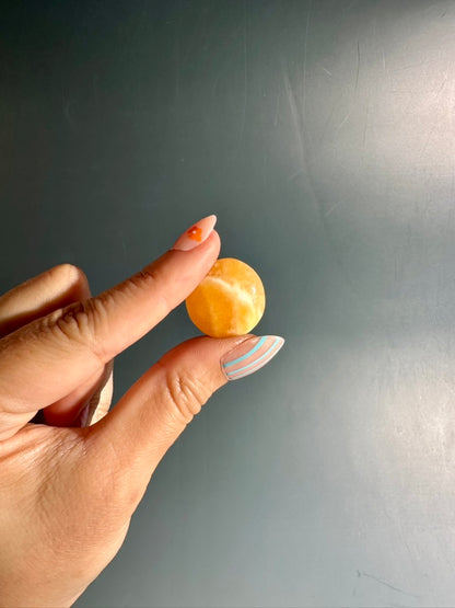 Orange Calcite Mini Round Flat Palm
