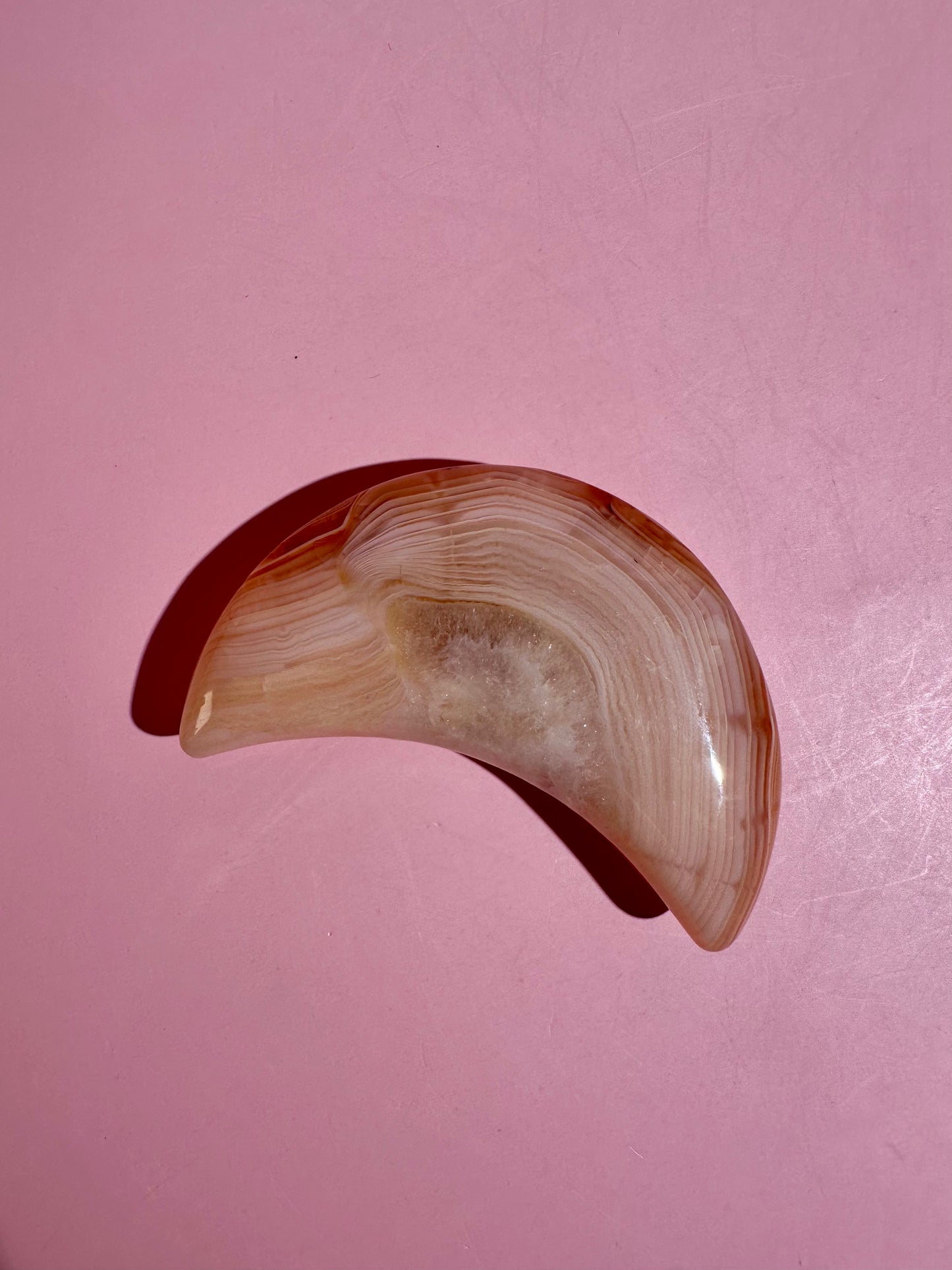 Carnelian Agate Crescent Moon on Black Stand – Option A | Courage, Vitality & Celestial Energy